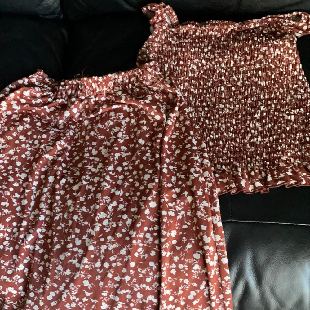 Really cute two piece crop top with long skirt. Fairly new. Only worn once!